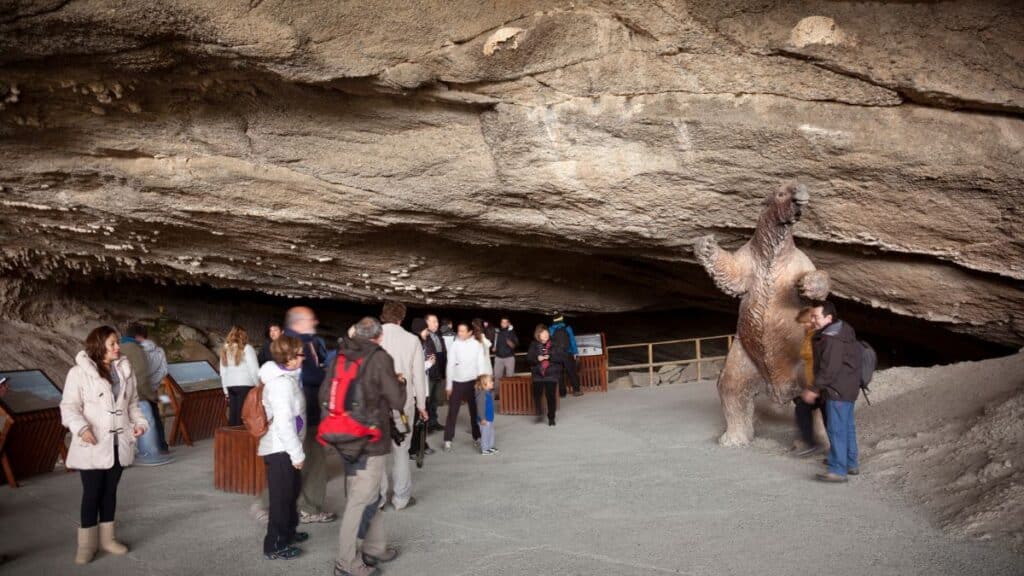 Tourists Visiting Milodon Bear Cove in Las Torres del Paine Natural Park Patagonia