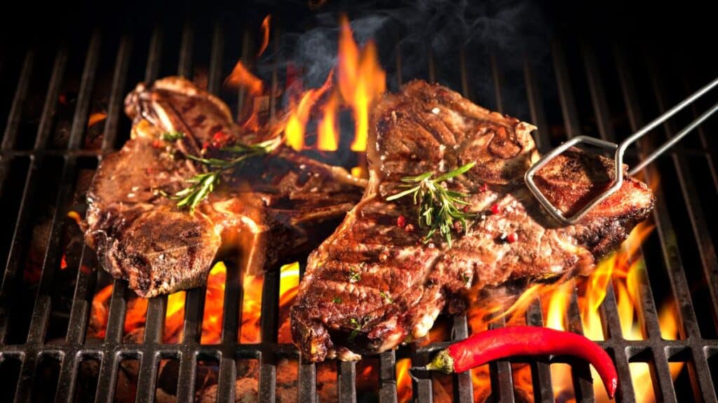 Beef T-bone Steaks On The Grill Cooking Food