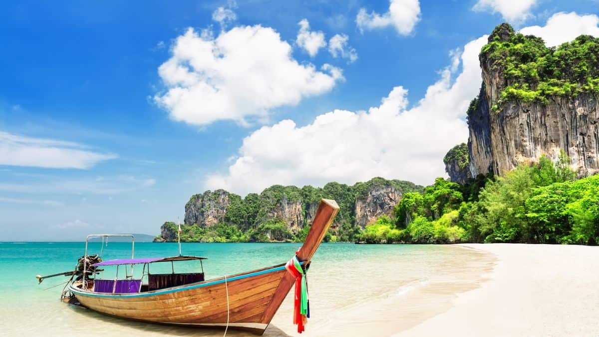 Thai traditional wooden longtail boat Stock
