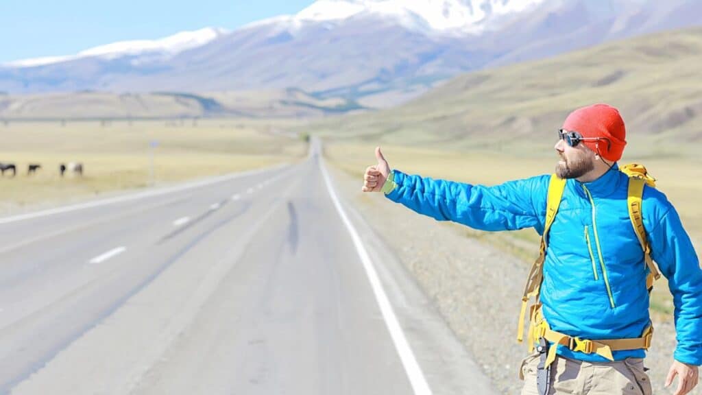 Hitchhiking Highway adventure Stock