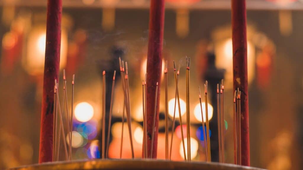 Light an Incense at the Temple Stock