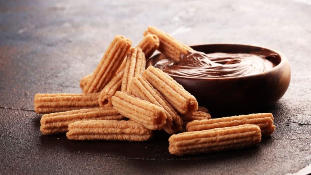 Traditional Spanish dessert churros Stock