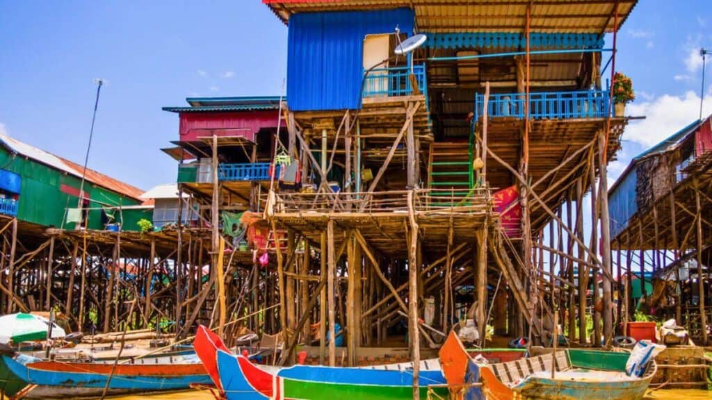Traditional Kampong Phluk floating village with multicolored boats Stock