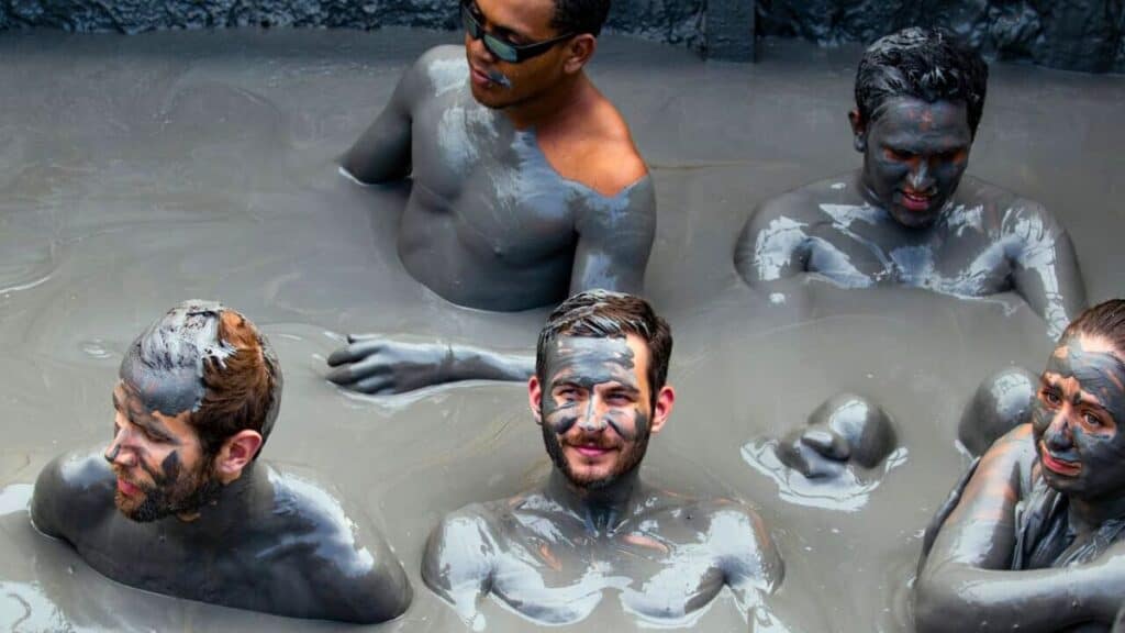 People-In-Mud-Volcano-in-Cartagena-Colombia-Stock