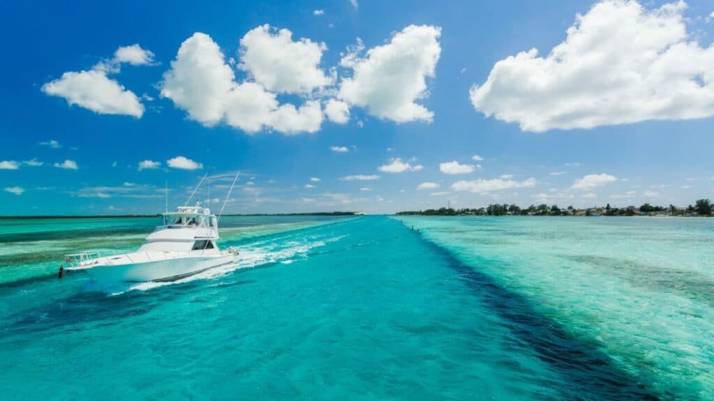 Small Yacht Sailing in a Sea Stock
