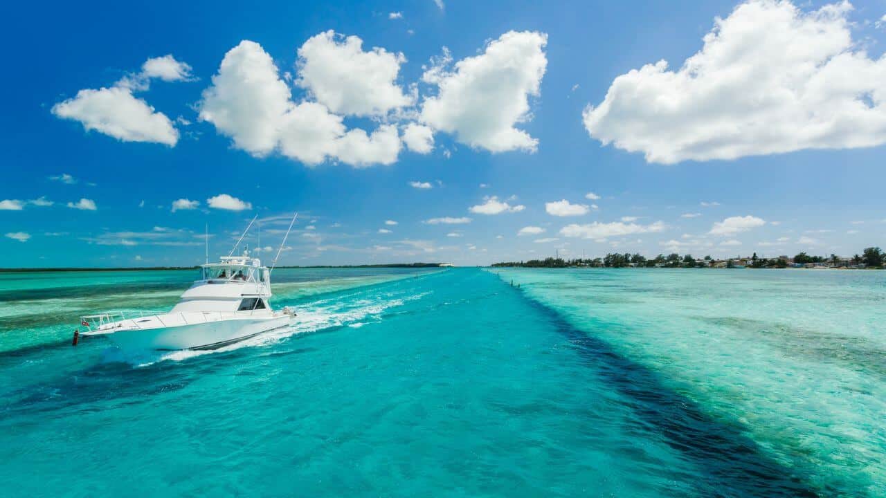 Small Yacht Sailing in a Sea Stock