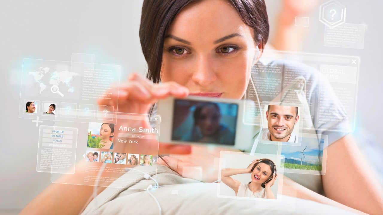 Young pretty woman using social media stock
