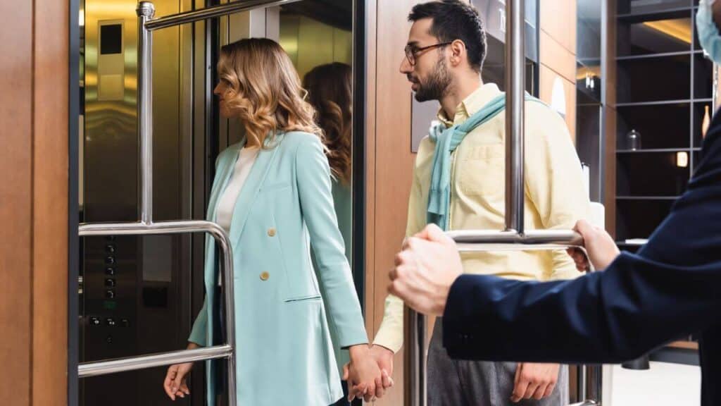 Couple Entering The Hotel Stock