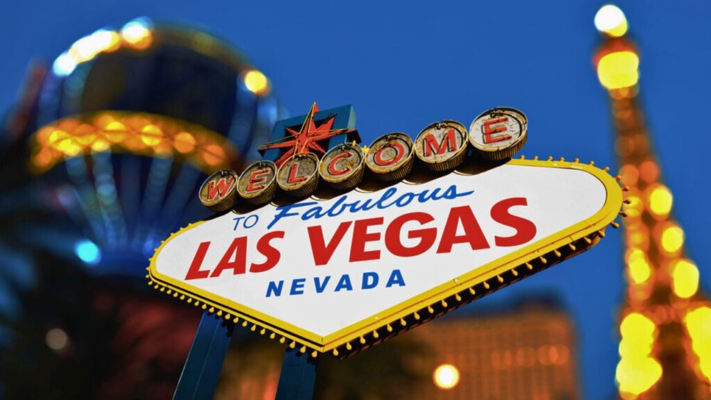 Las Vegas Sign with Vegas Strip in background Stock