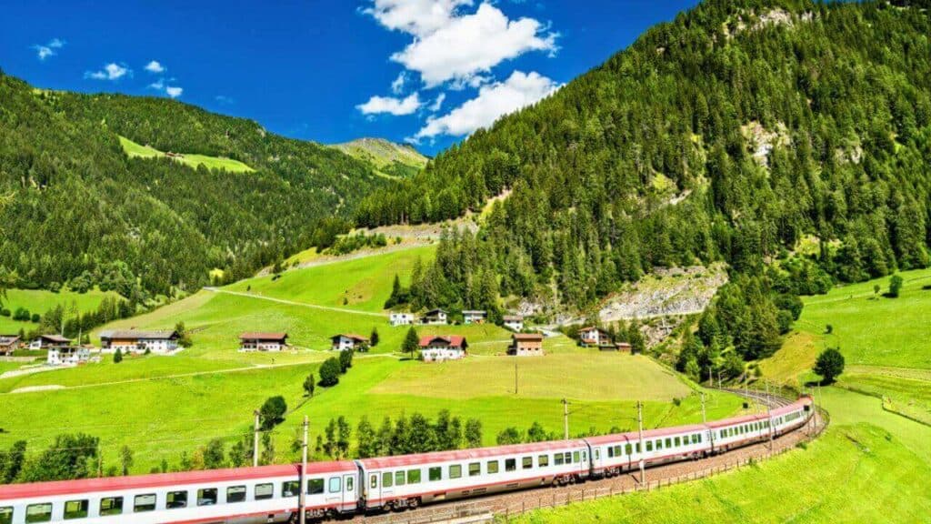 Passenger train at the Brenner Railway in Austria Stock