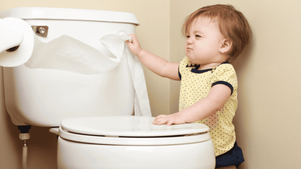 Baby Pulling on the Toilet Paper Stock