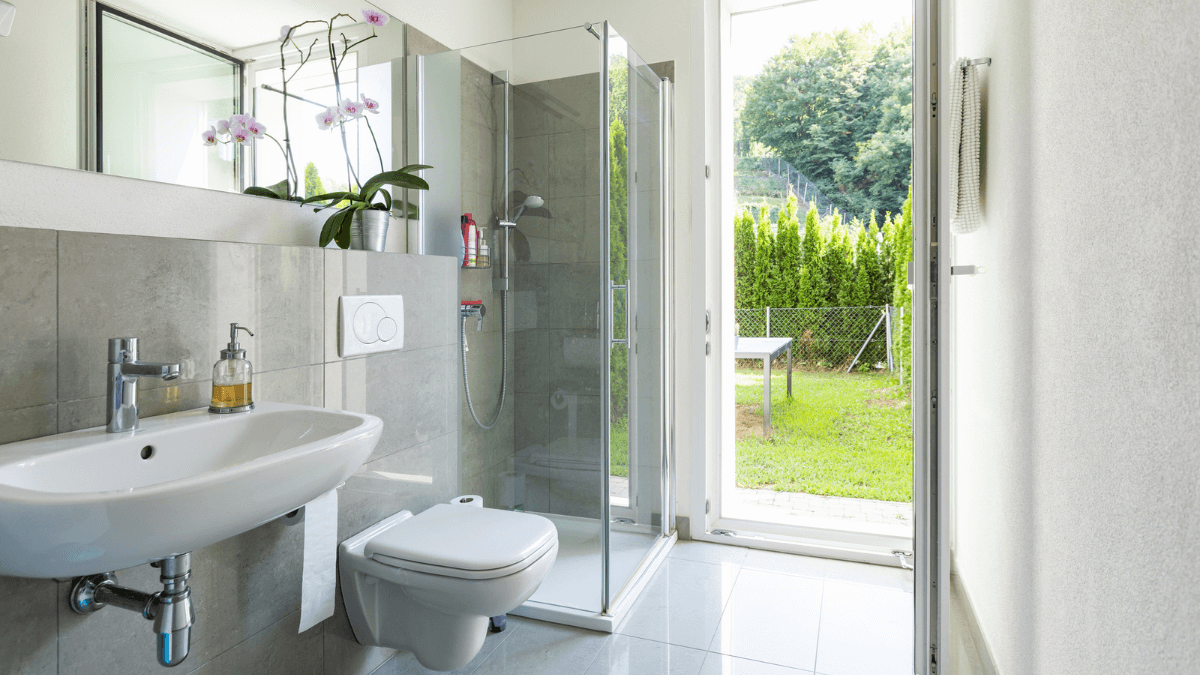 Bathroom with Shower and Toilet Stock