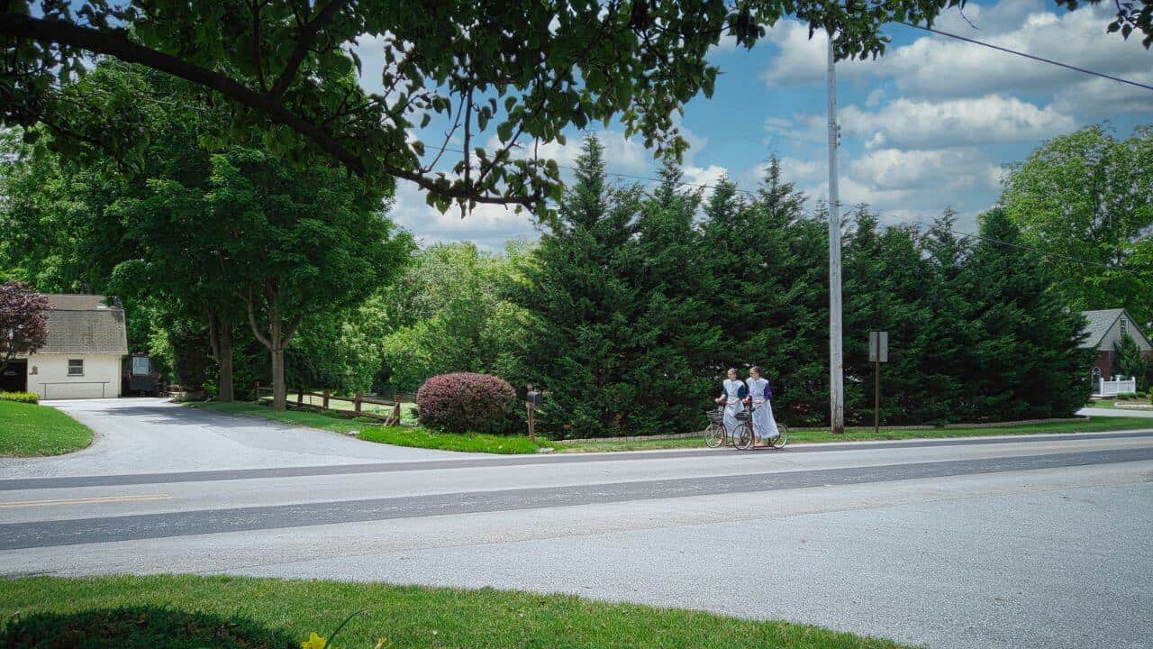 Gordonville Pennsylvania Girls Traveling On Scooter