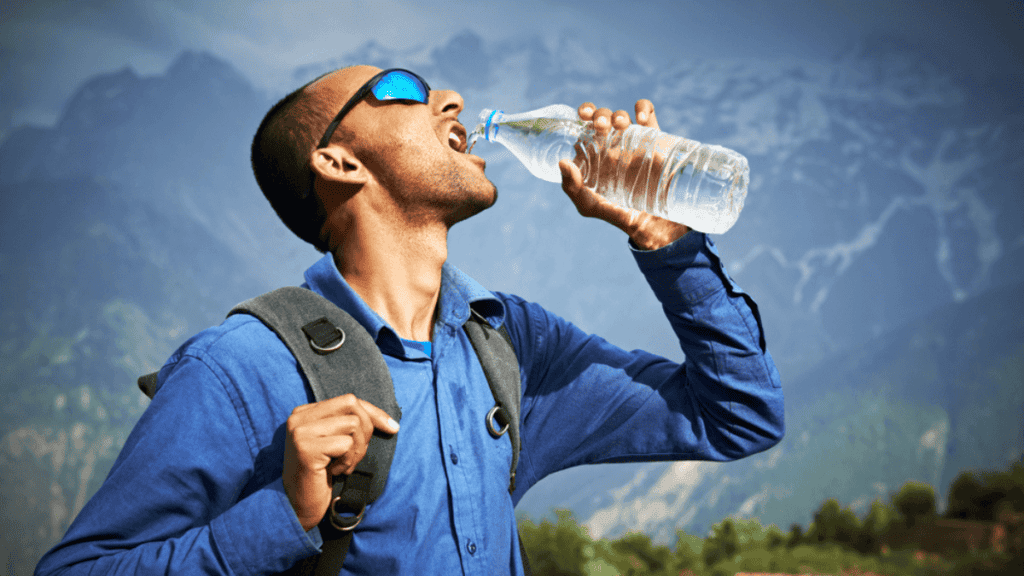 Man Drinking Bottled Water Stock