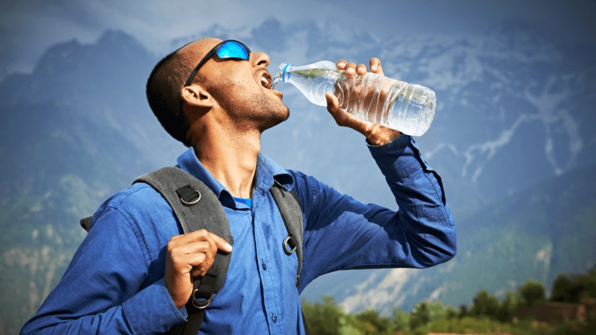 Man Drinking Bottled Water Stock