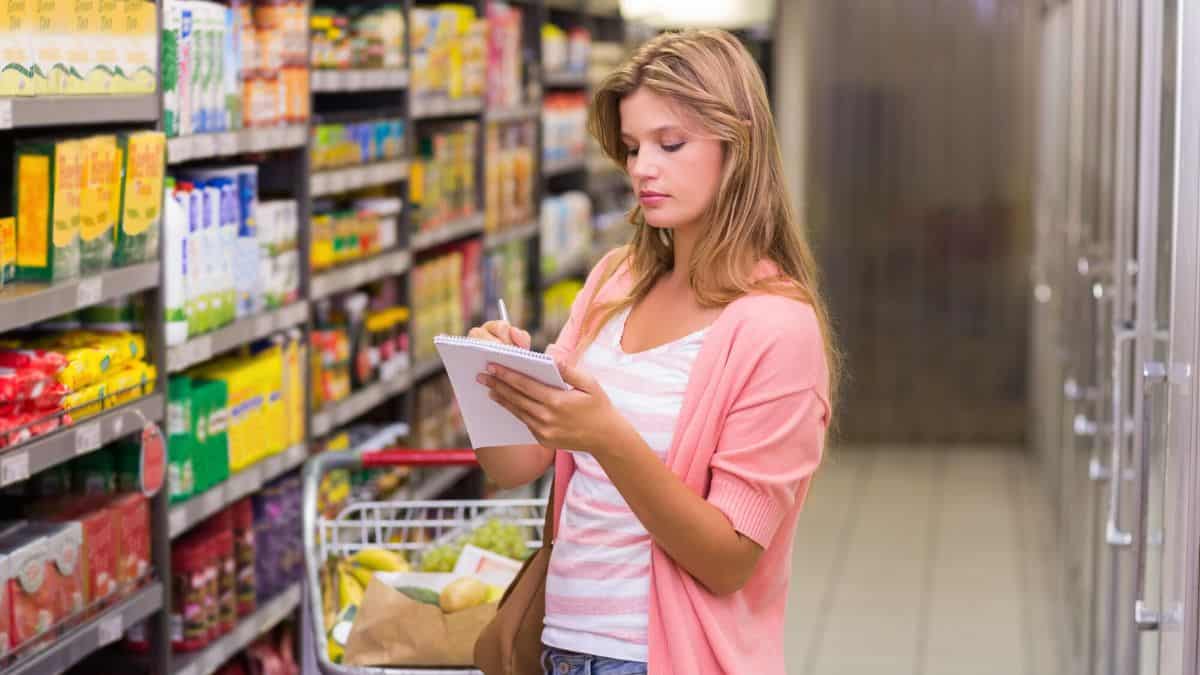 Woman Grocery Shopping Stock
